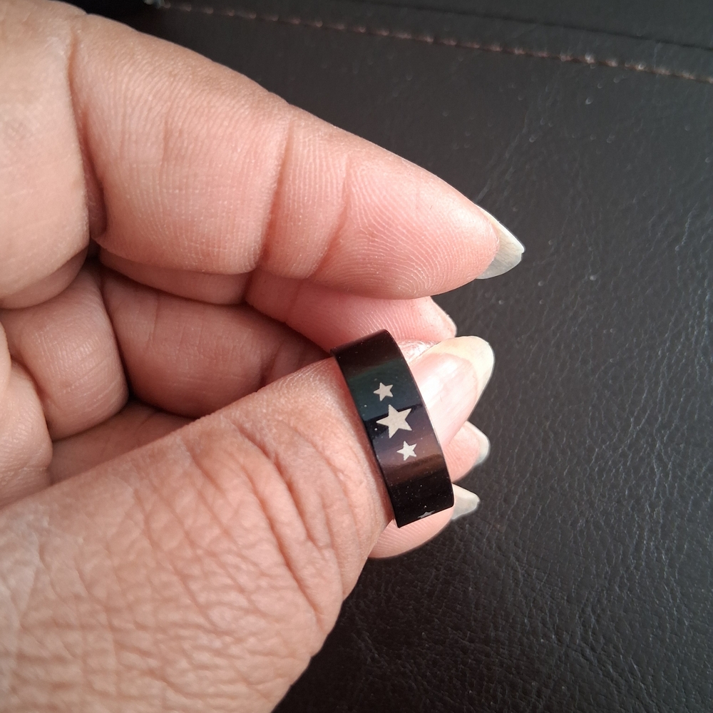 Black Ring with Star Design